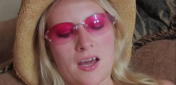  Horny chick with pink glasses touches herself